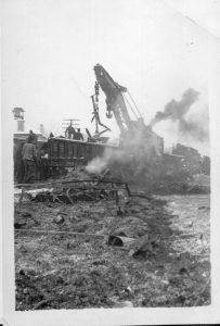Black and white photograph of the wreckage of the Almonte Train Wreck being cleaned up on December 28, 1942.